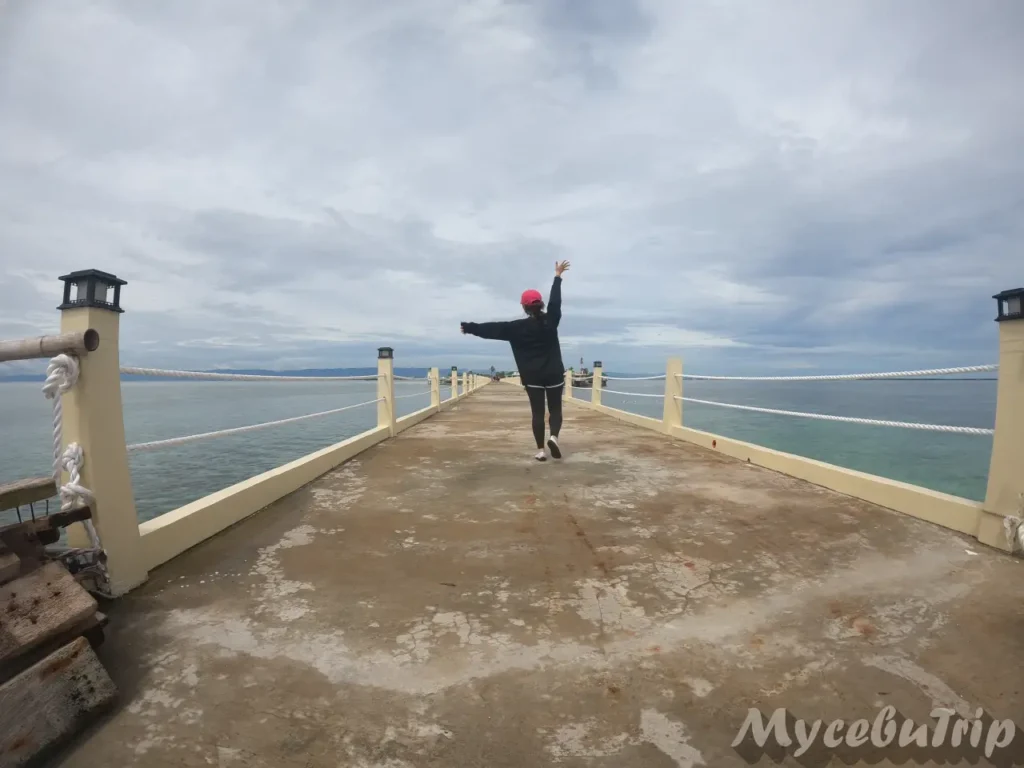 Scenic view of the long wooden bridge at Nalusuan Island